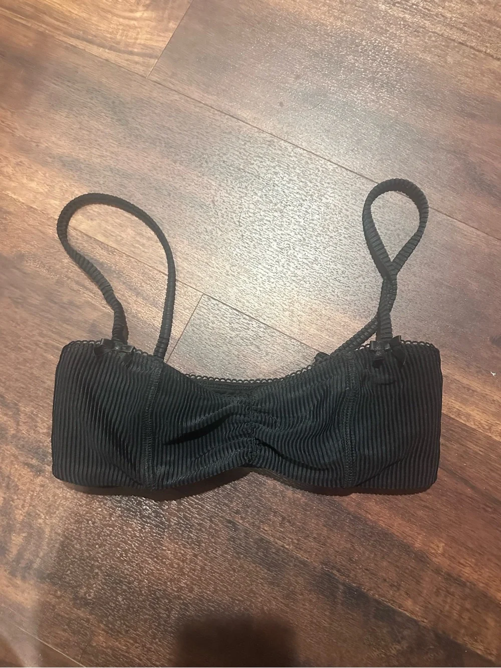 Frankie’s Bikinis black bathing suit top